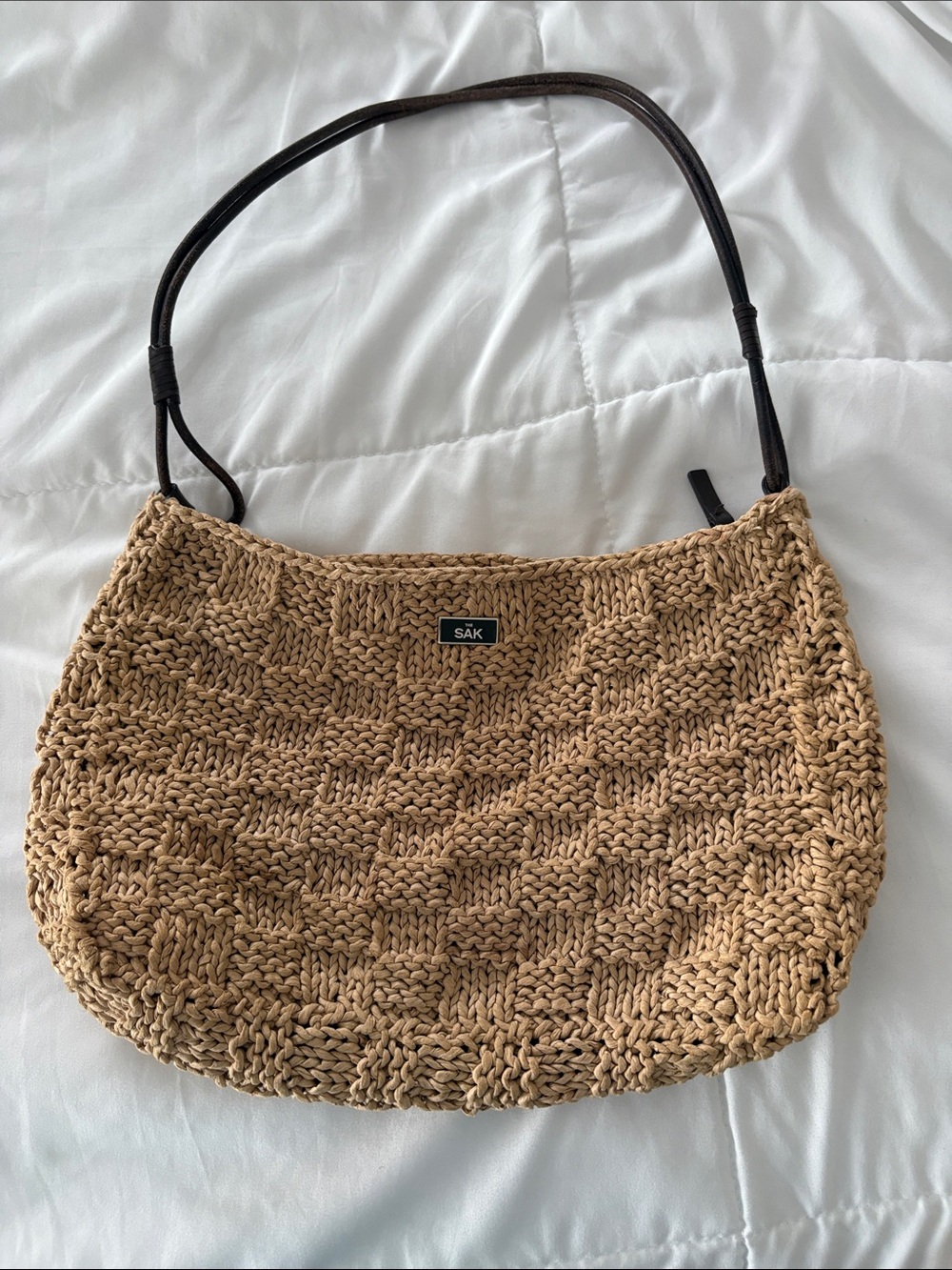 The Sak Woven Straw Shoulder Bag in Tan with Dark Brown Strap